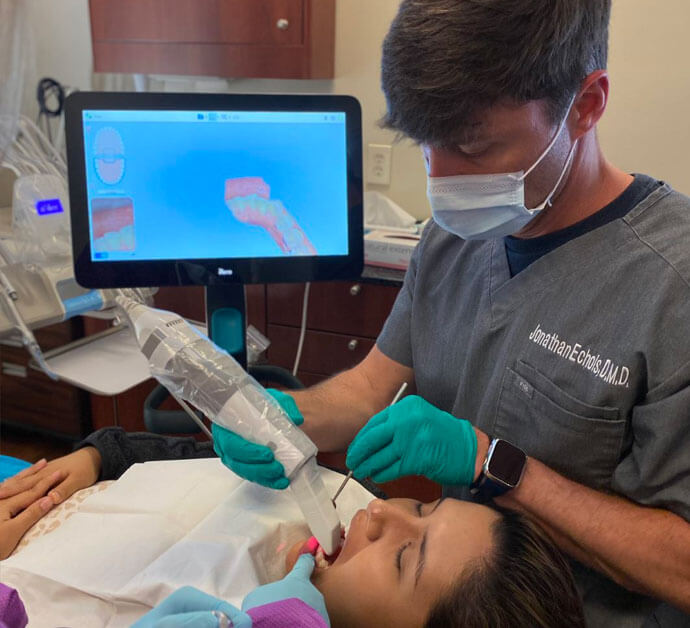 Dr. Echols working with a patient