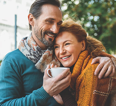 happy couple drinking coffee together