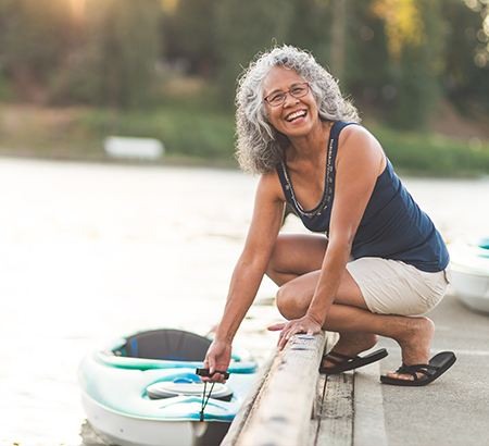 senior woman with kayak