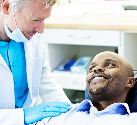 dentist comforting a patient