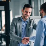 business man feeling more confident after cosmetic dental treatments