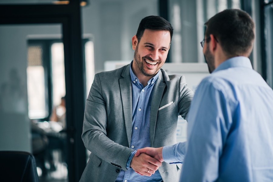business man feeling more confident after cosmetic dental treatments