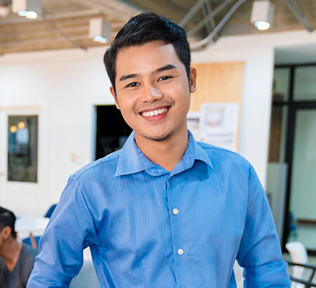 smiling young man at work