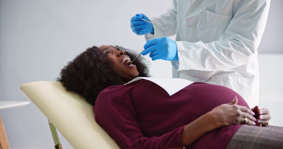 pregnant woman at the dentist for dental care for pregnant women