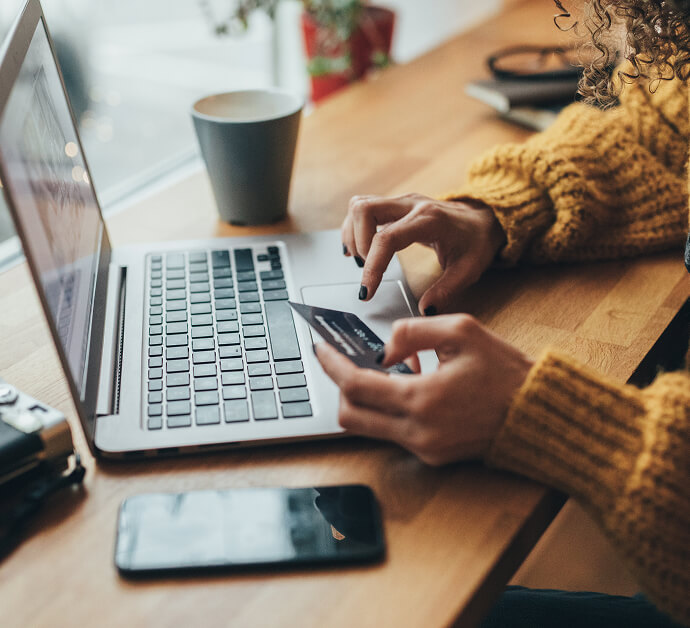 a person paying bill on computer